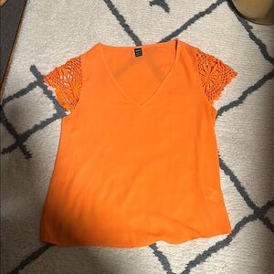Shein Orange Blouse with crochet sleeves. Washed, but never worn. Not my color